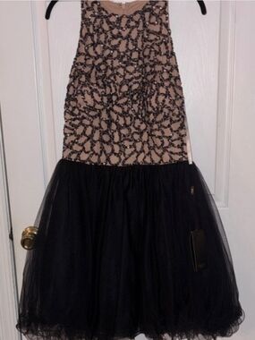 Elegant Black Tulle Party Dress with Beaded Nude Bodice